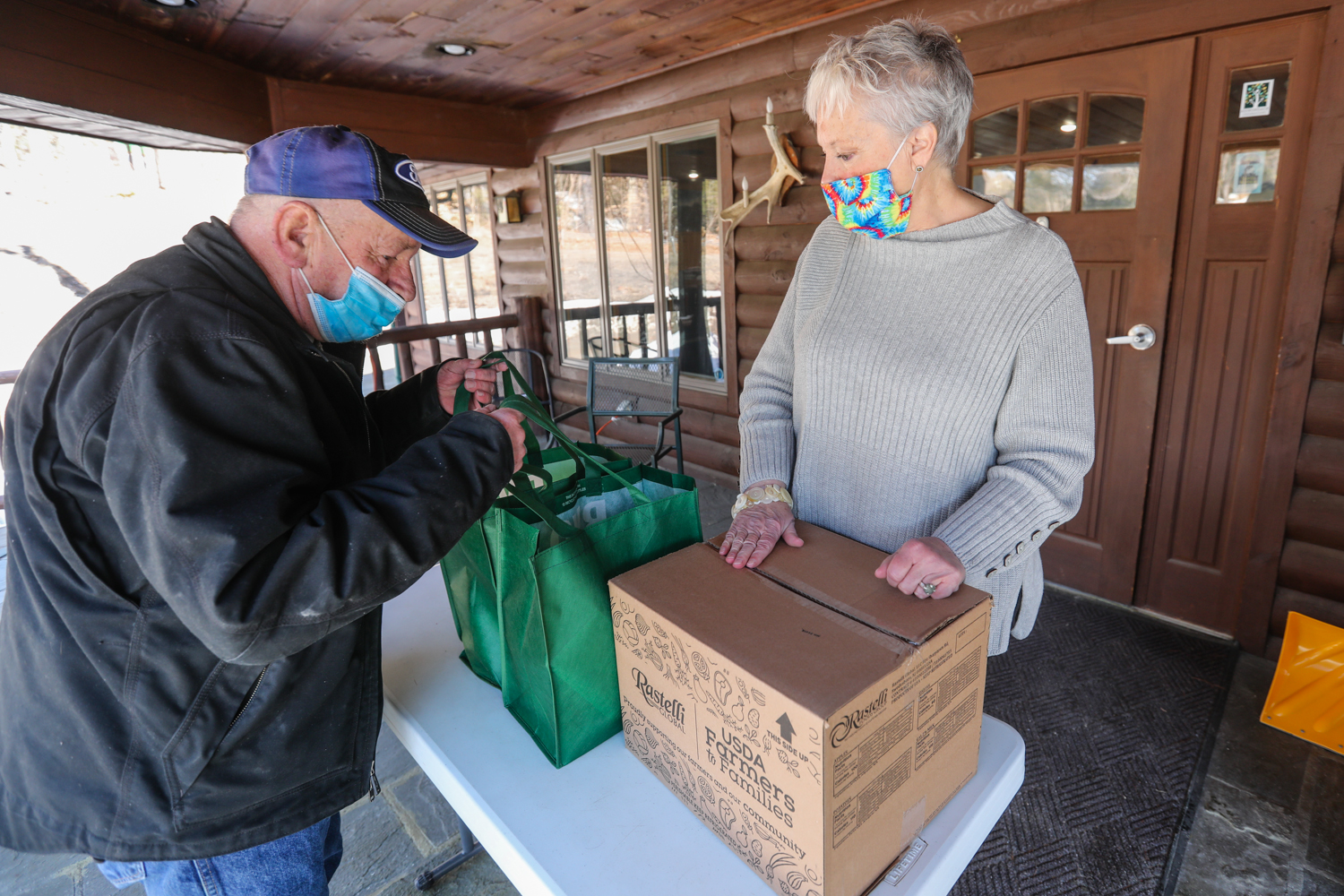 A man visits North Country Ministry's food pantry at the YMCA Adirondack Center