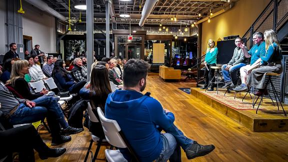 A group of people meeting at a community space